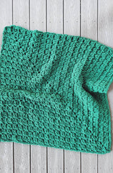Top down view of crochet throw, showing mitered square construction.  thumbnail