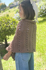 Side back view of crochet poncho.  thumbnail