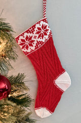 Heritage stocking with fair isle cuff in red and white. The heel and toe are white and the leg and foot are red with a textured stitch pattern.  thumbnail