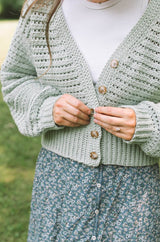 Close up of front of cardigan, with button band partially done up.  thumbnail