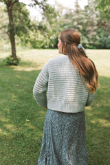Back view of crochet cardigan, showing horizontal bands of texture.  thumbnail