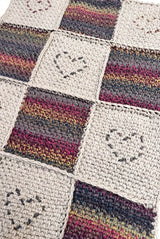 Top down view of crochet patchwork afghan, with alternating squares.  thumbnail