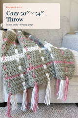 crocheted sage green tartan plaid throw blanket featuring cream and rose woven vertical stripes and fringe tassel ends thumbnail