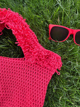 crochet bag and matching sunglasses on the grass thumbnail