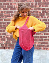 woman looking into crochet bag thumbnail