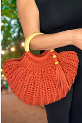 purse on womans arm thumbnail