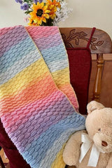Crochet Blanket Beside A Teddy Bear thumbnail