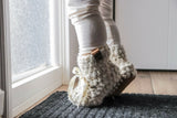 Crochet Boots Worn By A Baby thumbnail