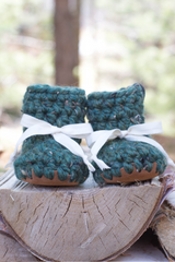 Crochet Boots On A Wood thumbnail