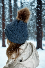 back view of child wearing crochet hat with pom pom thumbnail