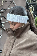 woman wearing a knit head warmer made with Hometown yarn thumbnail