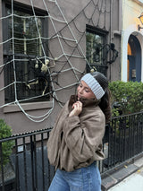 woman wearing a knit head warmer made with Hometown yarn thumbnail