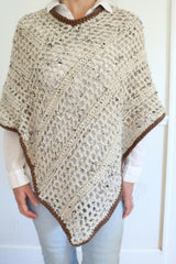 Crochet Poncho Worn By A Woman thumbnail