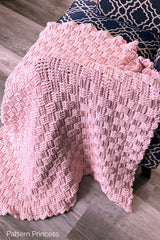 Pink blanket draped over chair thumbnail