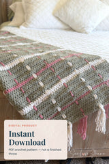 crocheted sage green tartan plaid throw blanket featuring cream and rose woven vertical stripes and fringe tassel ends thumbnail