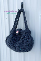 dark blue crocheted hobo handbag with a button closure thumbnail