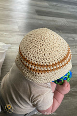baby wearing crochet bucket hat thumbnail
