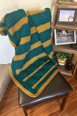 Crochet Lapghan On A Chair thumbnail