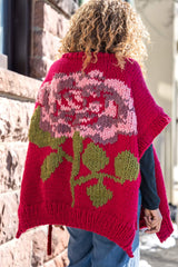 Flower design on back of poncho thumbnail
