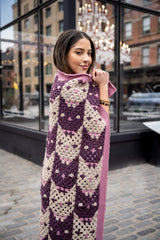 woman wrapped in cat face blanket thumbnail