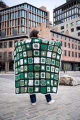 granny square blanket on a model thumbnail
