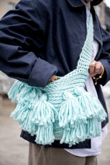 Crochet crossbody bag with tassels close up thumbnail