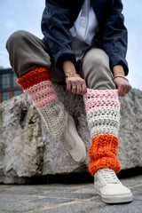 Model pulling on top of legwarmer thumbnail