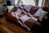knit blanket on a couch thumbnail