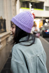 Another side of woman wearing crochet hat with subtle color changes thumbnail