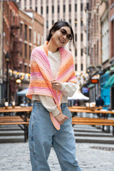woman wrapped in crochet shawl from the front thumbnail