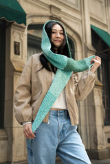 woman wearing green multicolor hooded scarf thumbnail