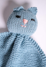 closeup of blue knit cat lovey thumbnail