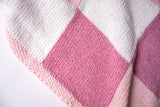 close up of knit gingham blanket  thumbnail