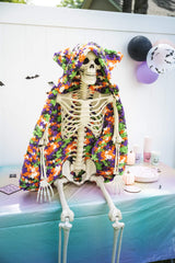 Crochet Halloween hooded blanket on a skeleton decoration thumbnail
