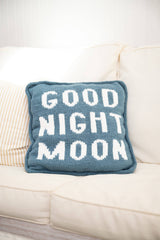 blue knit pillow with glow in the dark white letters that spell Good Night Moon thumbnail