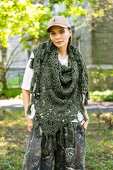 woman wearing a fringed shawl around her neck thumbnail