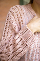 closeup of pink crochet cardigan thumbnail