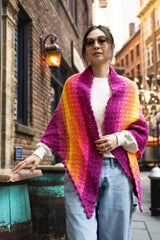 woman wrapped in triangle shawl thumbnail