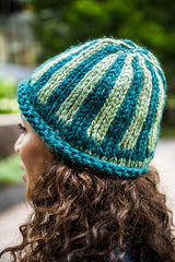 Woman wearing knit hat with blue stripes thumbnail