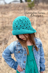 Crochet Hat Worn By A Child thumbnail