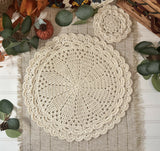 cream crocheted circular scalloped edge placemat and matching coaster on a textured table runner thumbnail