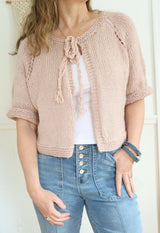Knitted Cardigan Worn By A Woman thumbnail