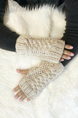 two hands wearing fingerless gloves on a faux fur background thumbnail