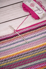 striped blanket crochet hook and coboo yarn ball thumbnail