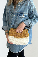 woman holding two tone sherpa bag thumbnail