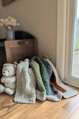 multicolor blanket with a teddy bear thumbnail