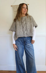 Knitted Poncho Worn By A Woman thumbnail