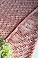 close-up of dusty rose waffle wave crocheted blanket thumbnail