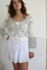 Crochet Cardigan Worn By A Woman thumbnail