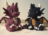 2 crochet amigurumi stuffed animal of a dragons thumbnail